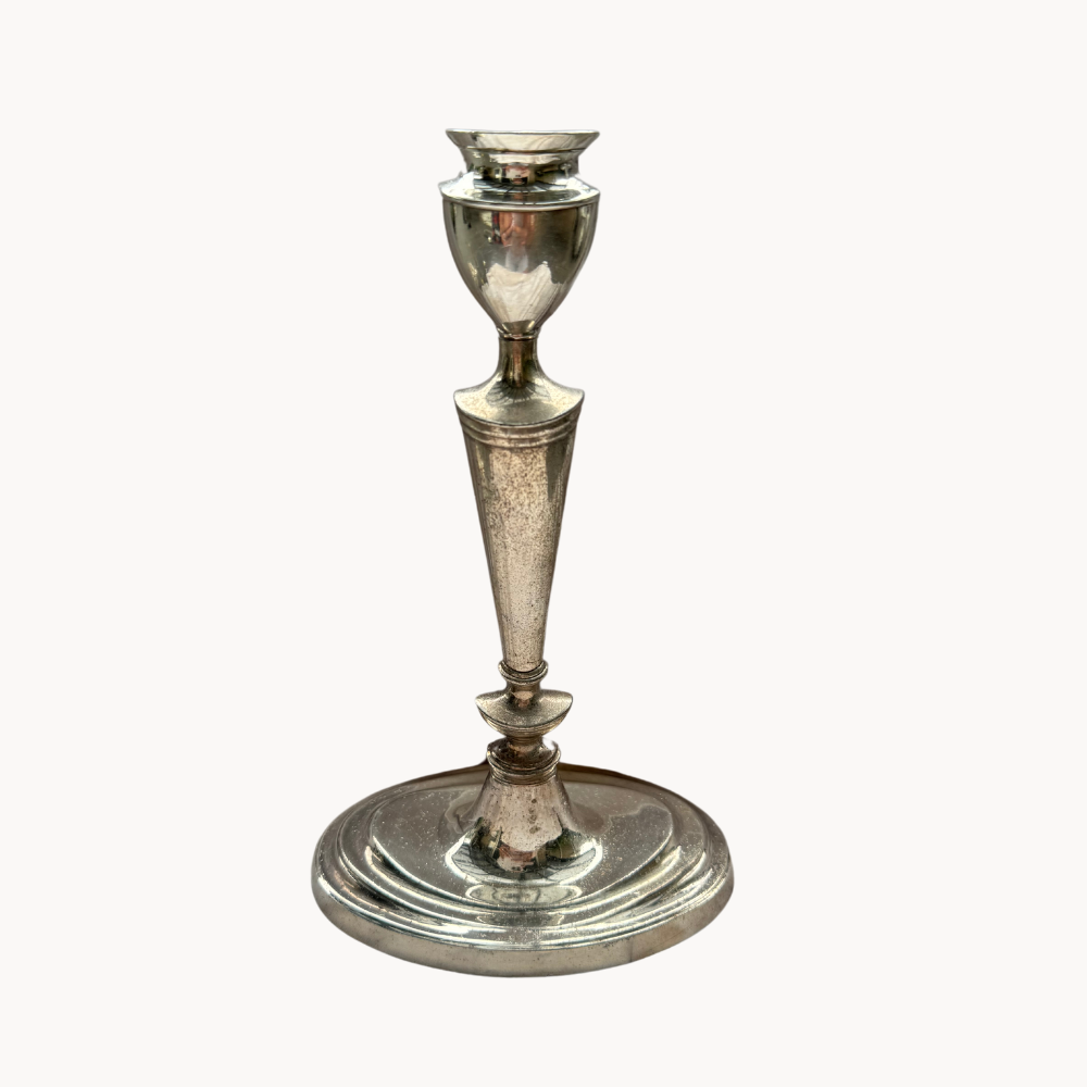 Shiny silver decorative candlestick.