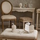 Beige interior vignette with book