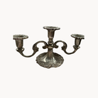 A vintage silver three-armed candelabra. 
